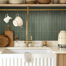 Green peel-and-stick backsplash tile Smart Tiles in a kitchen 