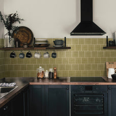 Green peel-and-stick backsplash tile Smart Tiles in a kitchen