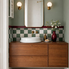 White and green checkerboard peel and stick backsplash tile by Smart Tiles in a vintage bathroom